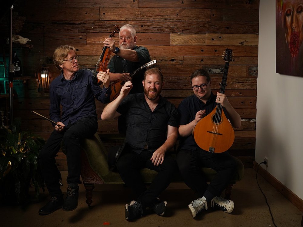 Finding Magic, four musicians together